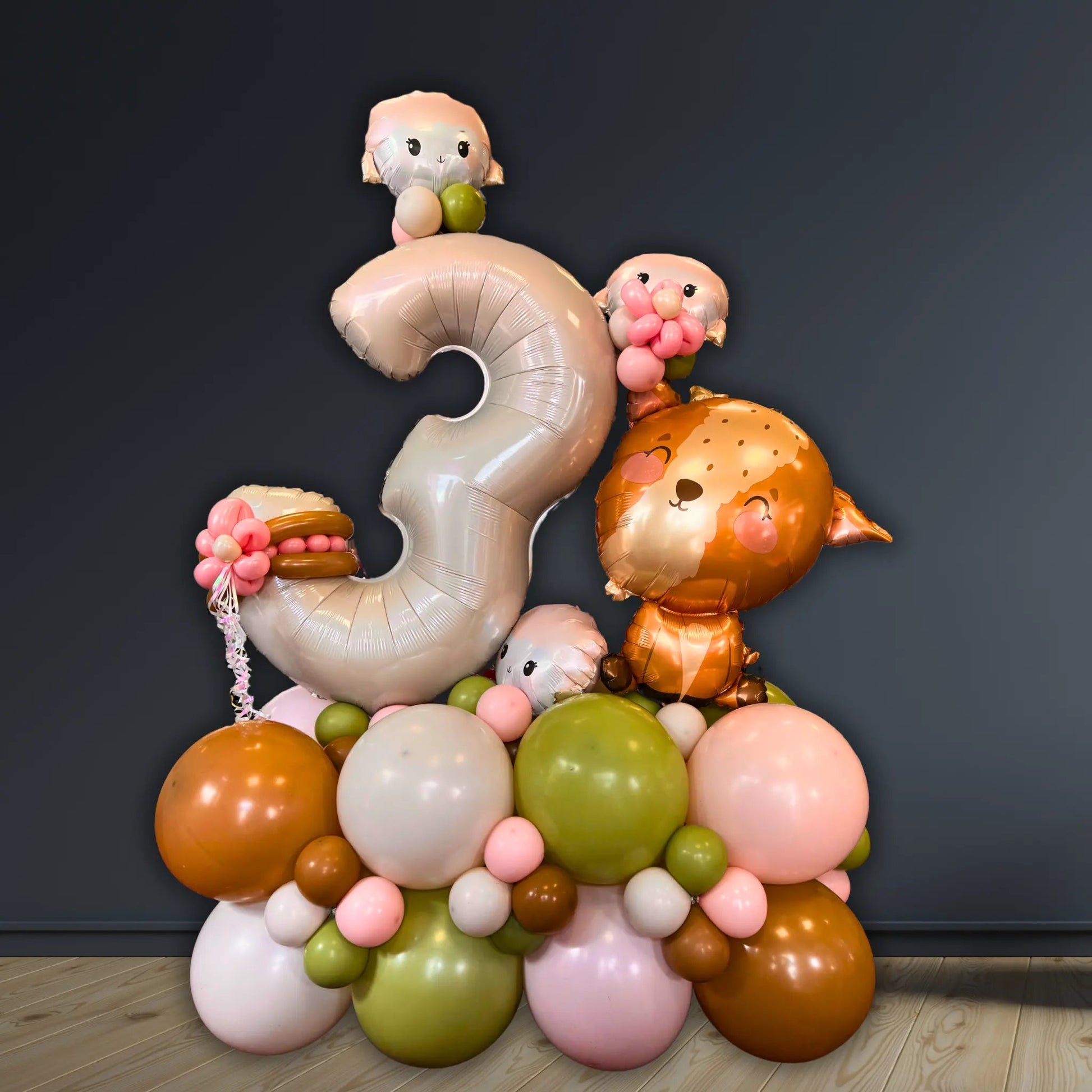 Cream Balloon Stack Ages 1–5 with Goats & Sheep Decor